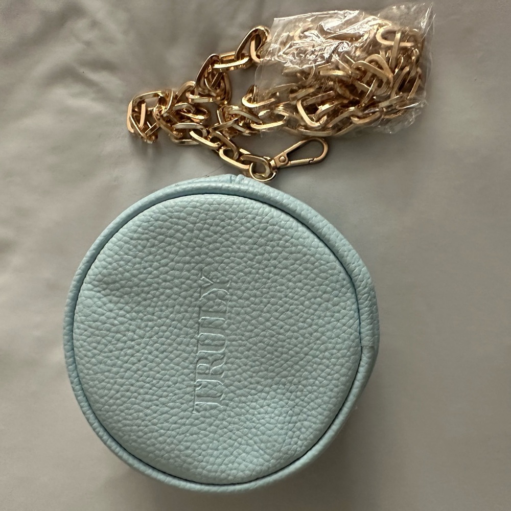 Small teal Truly cosmetics bag